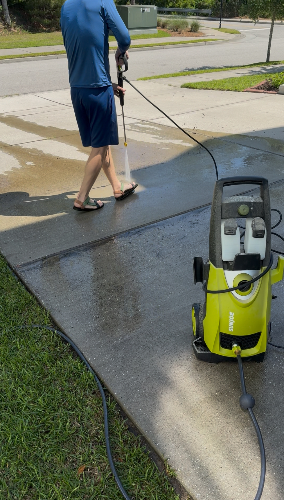 Pressure washing driveway - Charleston Crafted
