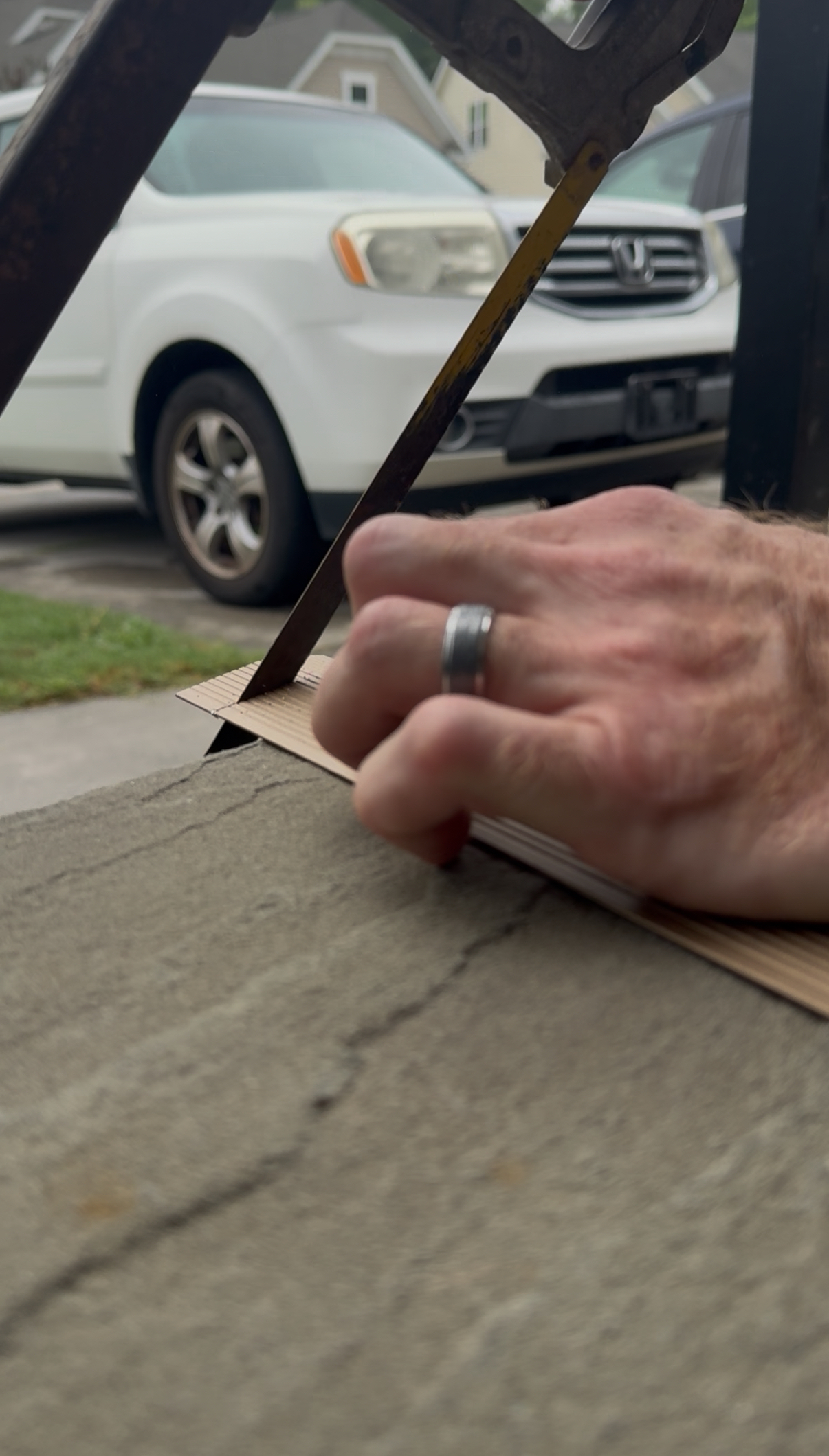 Cutting transition strip with hack saw