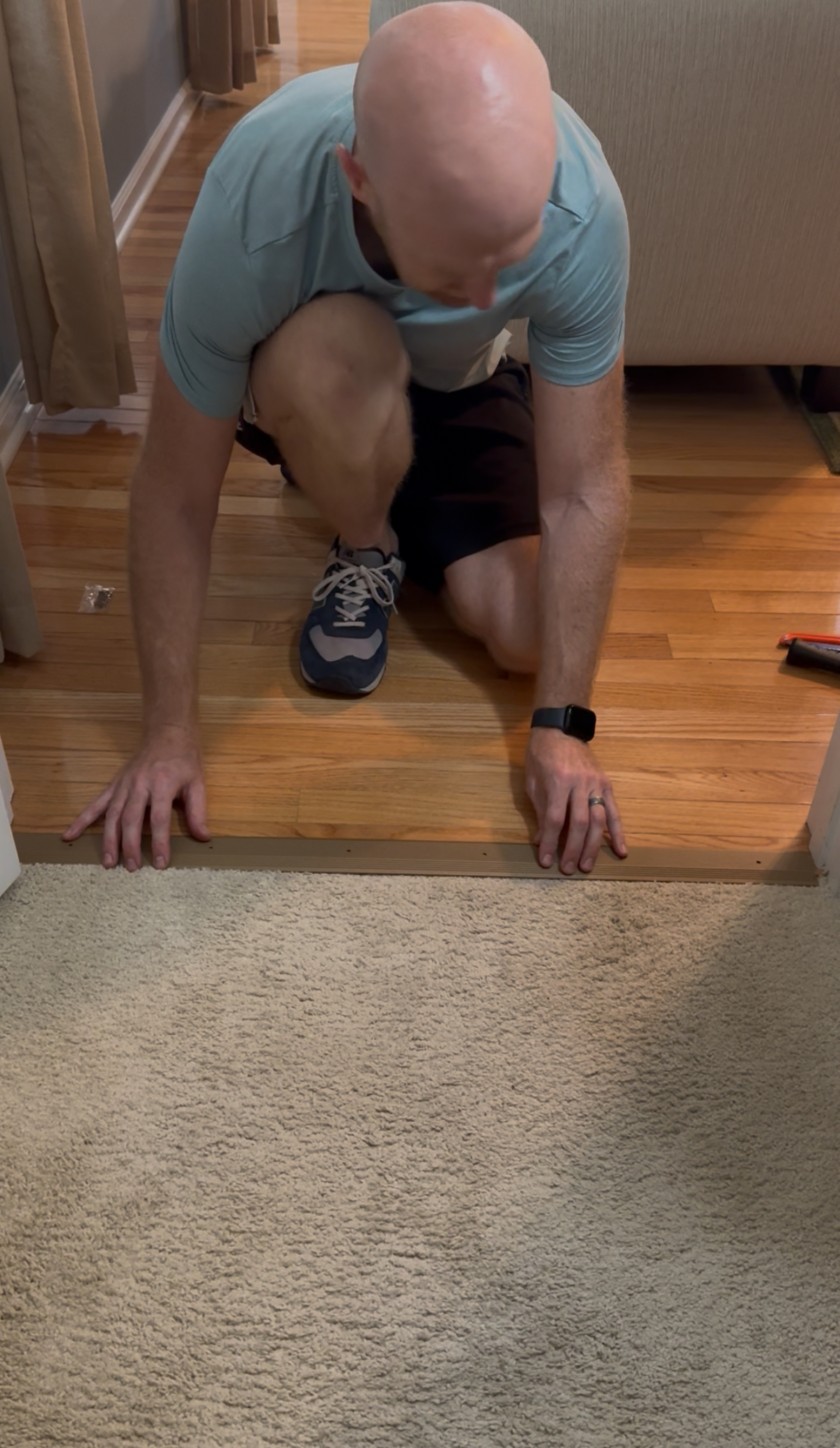 Aligning transition strip with doorway