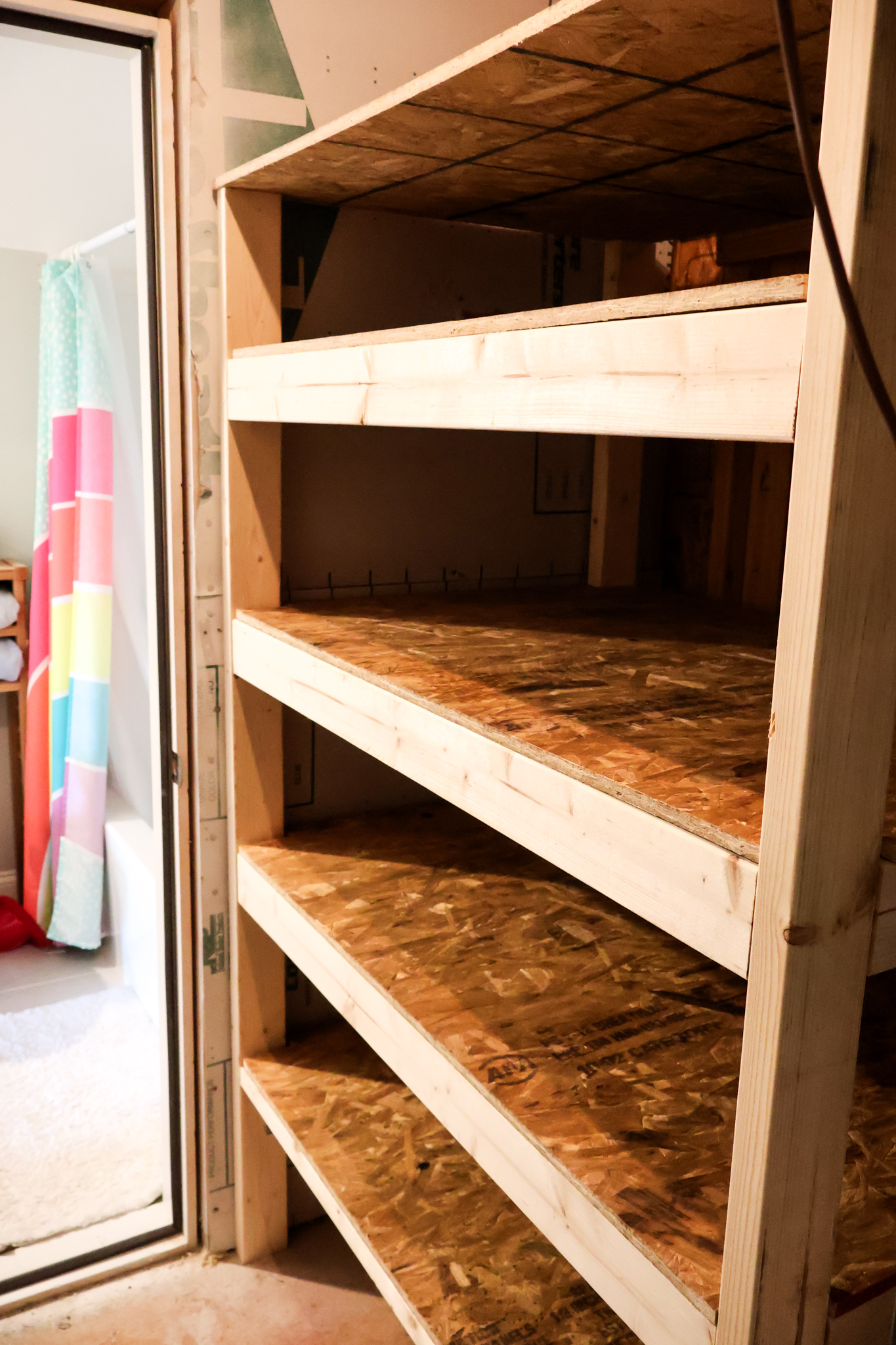 How to build standing shelves for the attic - Charleston Crafted