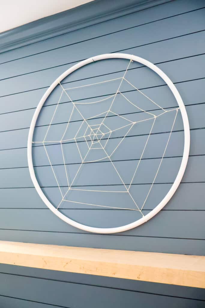 DIY hula hoop spiderweb wreath