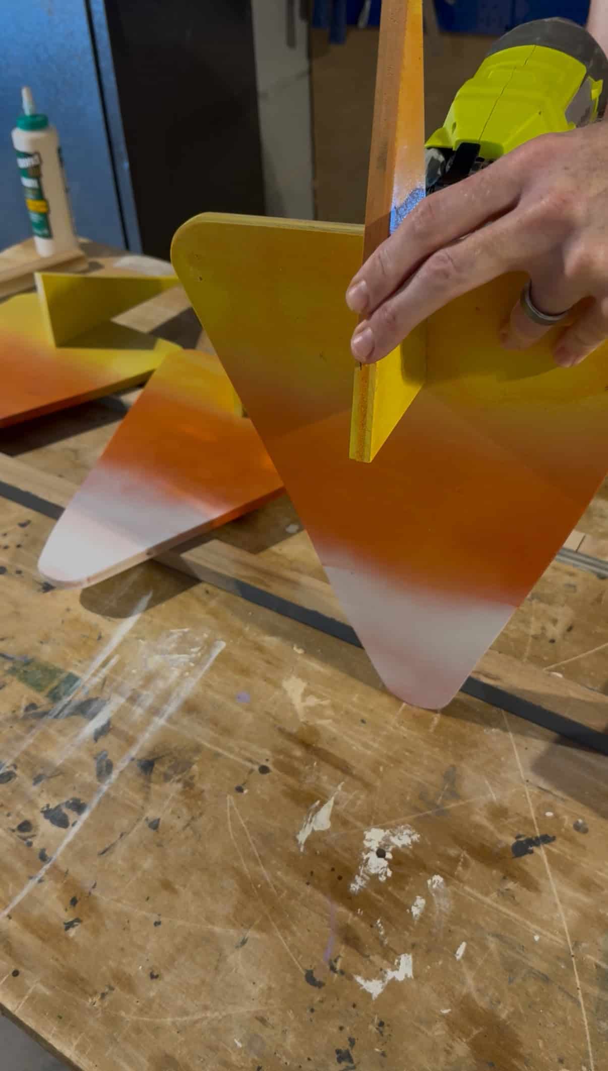 Attaching stake to back of candy corn