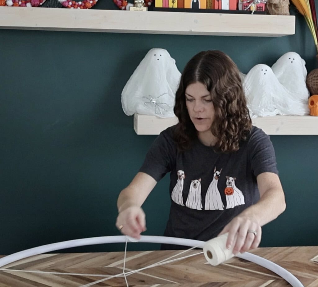 making a hula hoop spiderweb