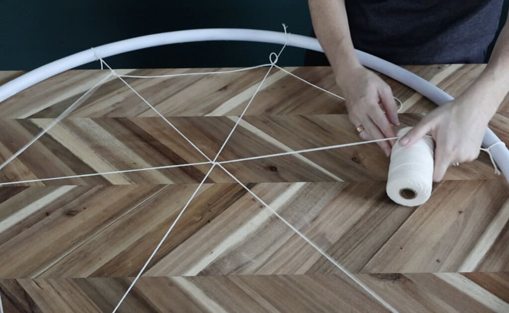 making a hula hoop spiderweb