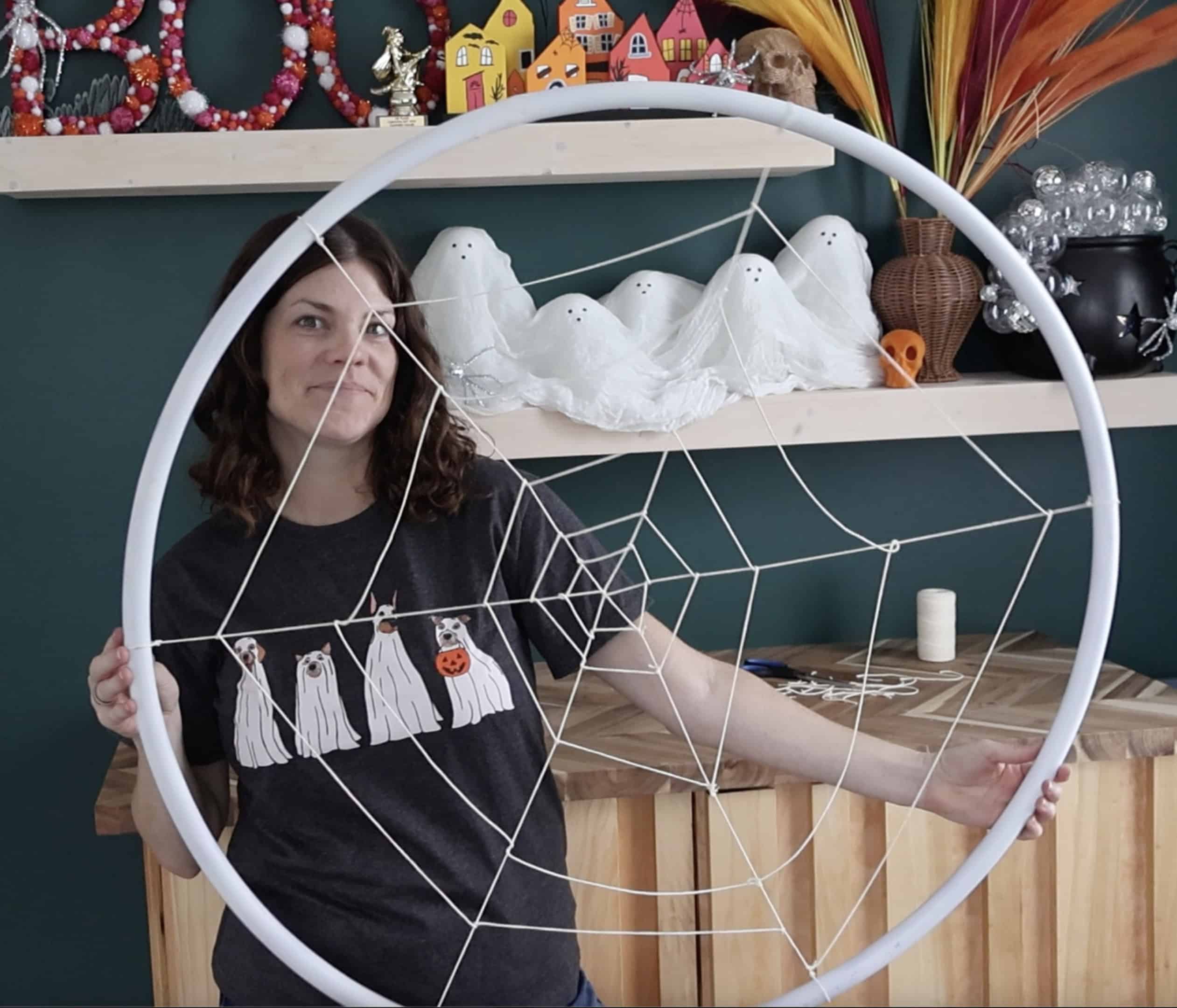 making a hula hoop spiderweb